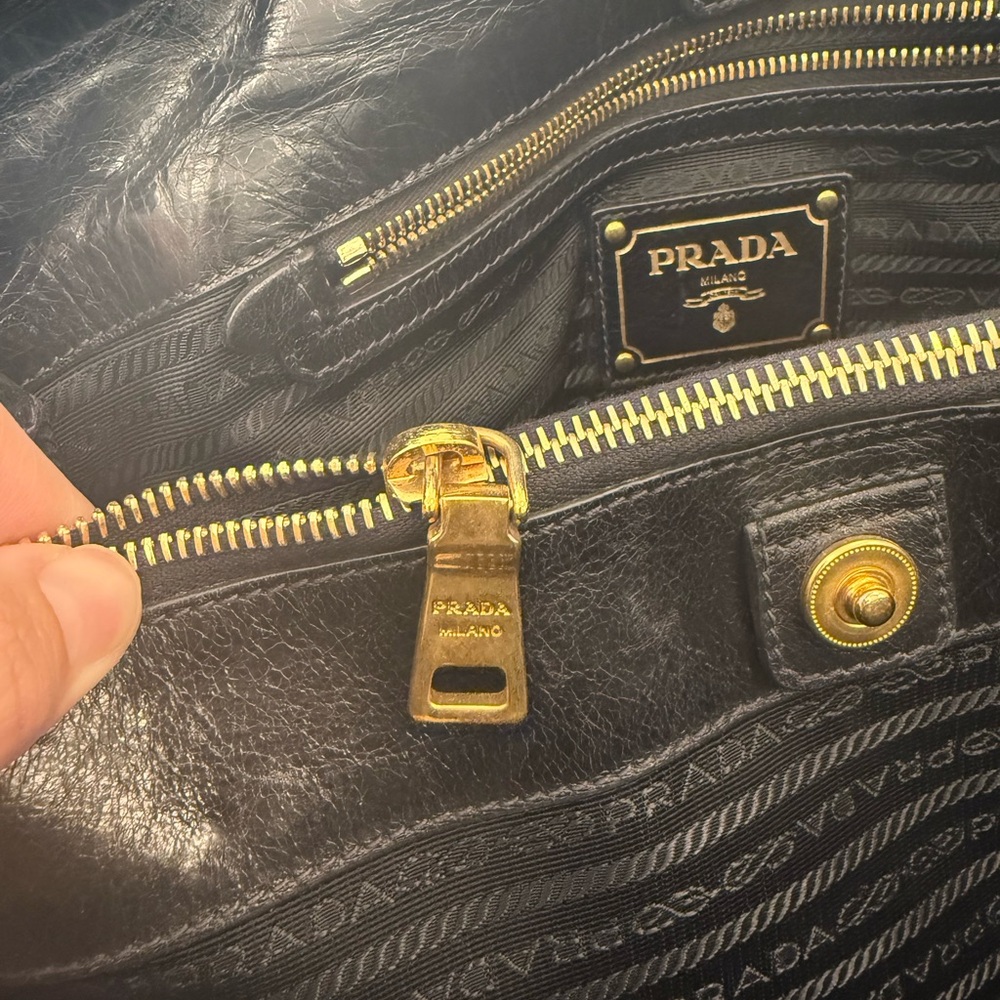 Prada Black Leather Handbag with Gold Accents - Picture 7 of 8
